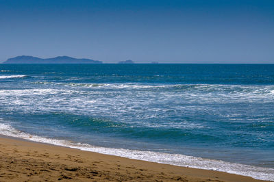 Scenic view of sea against clear sky