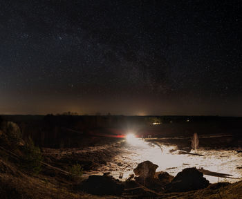 Scenic view of sea against sky at night