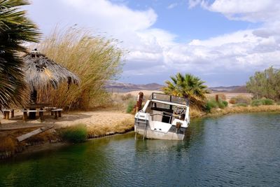 Scenic view of river against sky