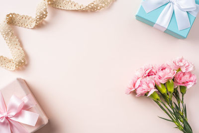 Close-up of pink flower on table