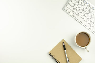 Directly above shot of coffee cup on table