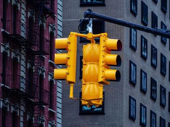 Low angle view of yellow building at construction site