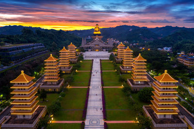 High angle view of temple building against sky during sunset