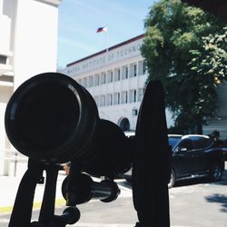 Man in front of building