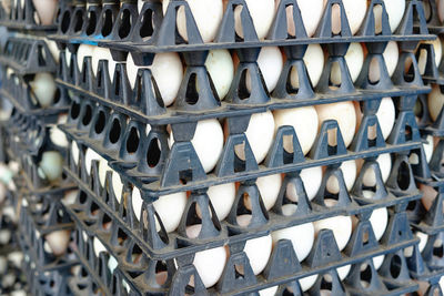 Full frame shot of bottles on rack