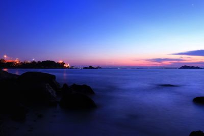 Scenic view of sea against sky at sunset