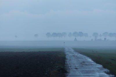 Scenic view of land against sky