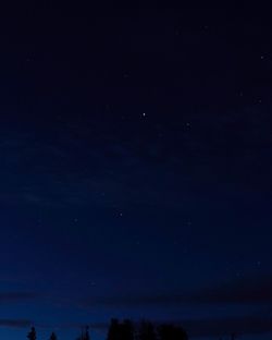 Scenic view of sea against sky at night