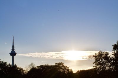 Silhouette of tower at sunset