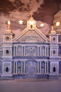 Exterior of illuminated historic building at night