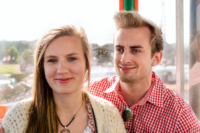 Young couple in ferris wheel