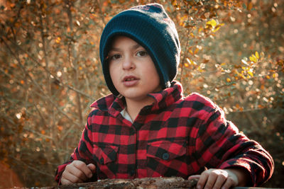 Young boy enjoying the outdoors in a candid shot while playing. 