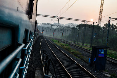 Train on railroad track against sky