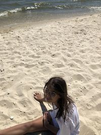 High angle view of woman on beach