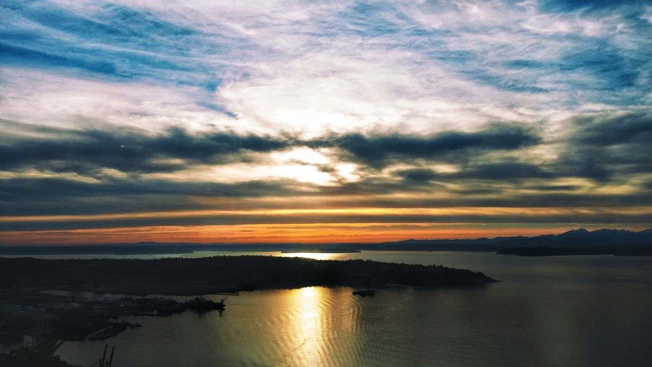 sunset, water, tranquil scene, scenics, sky, tranquility, beauty in nature, reflection, waterfront, cloud - sky, orange color, idyllic, nature, lake, sea, cloud, silhouette, dramatic sky, calm, moody sky