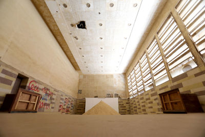 Low angle view of empty corridor in building