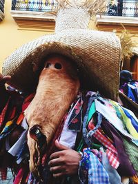 Close-up of man wearing hat