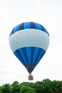 Low angle view of hot air balloon against clear sky