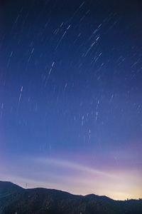 Scenic view of star field against sky at night