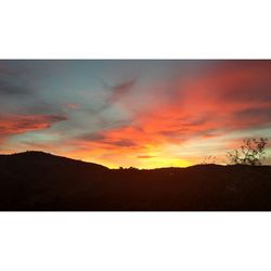 Scenic view of mountains at sunset