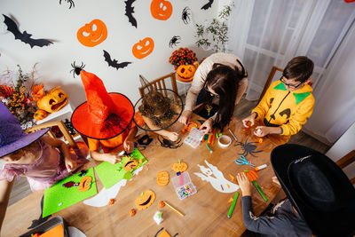 High angle view of people on table