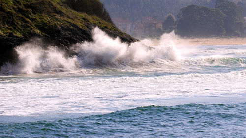 Sea waves splashing on shore