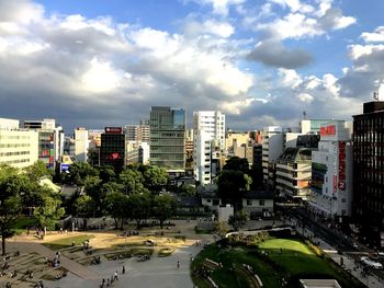 High angle view of street amidst buildings in city