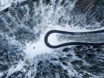 High angle view of sea by snow