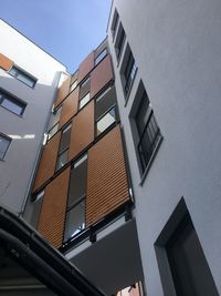 Low angle view of buildings against clear sky