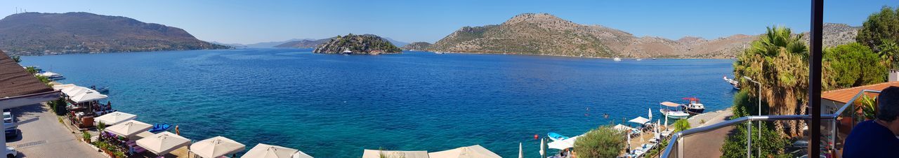 High angle view of sea against blue sky