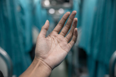 Close-up of hand holding hands