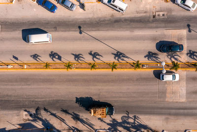 High angle view of airplane on airport runway