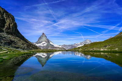 Beautiful reflection of the mattarhorn in the small lake riffelsee.