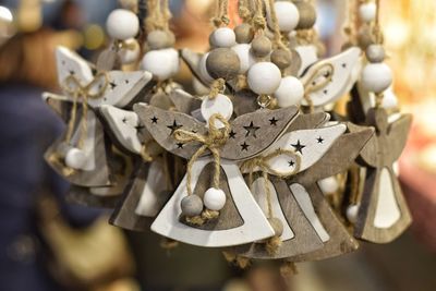 Close-up of decoration hanging on metal for sale