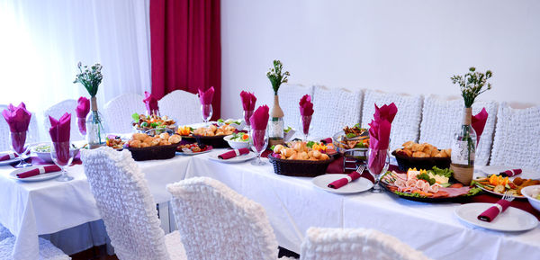 Panoramic shot of various flowers on table