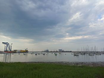 Scenic view of sea against cloudy sky