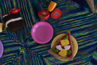 High angle view of multi colored candies on table