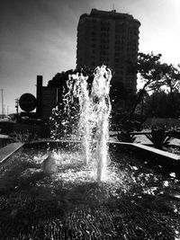 Fountain in front of buildings