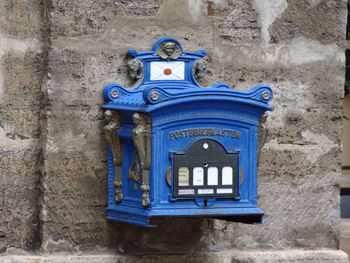 Close-up of mailbox on wall