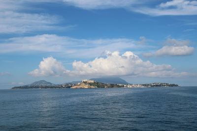 Scenic view of sea against cloudy sky