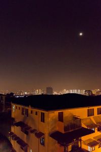 View of illuminated buildings at night