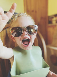 Portrait of young woman wearing sunglasses