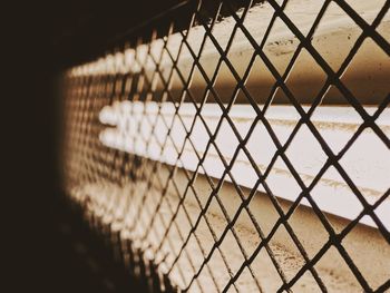 Close up of railings and neon light 