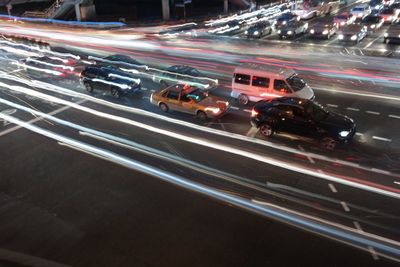 Traffic light trails on city street