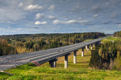 Bridge over road against sky