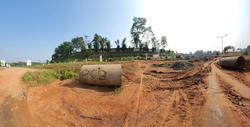 Panoramic shot of construction site against clear sky