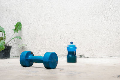 High angle view of bottles on wall
