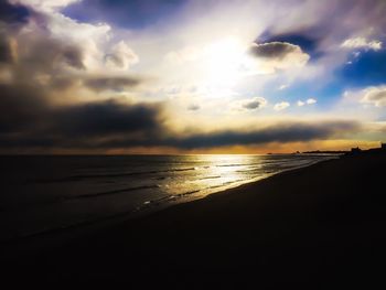 Scenic view of sea at sunset