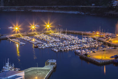 High angle view of illuminated city at night