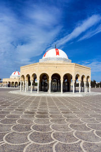 View of historical building against cloudy sky